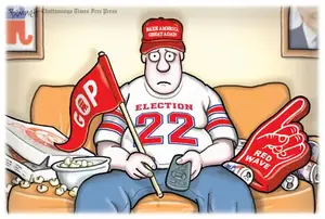 Cartoon of a confused MAGA supporter sitting on a couch with GOP signs, a red foam finger, and campaign items after the 2022 election.